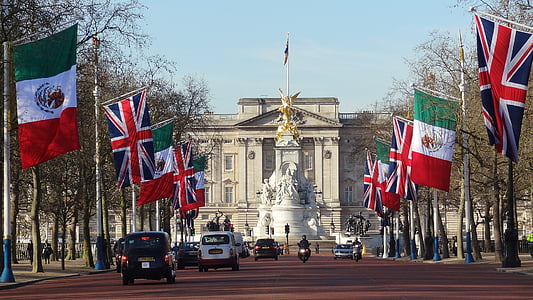 person riding motorcycle between flags thumbnail