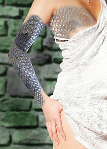 human showing a tattoo thumbnail