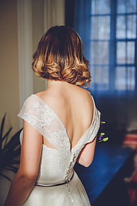 shallow focus photography of woman looking at a window thumbnail