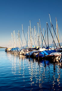 blue and white boats thumbnail