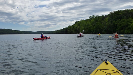 Kayakers paddling on Splitrock Reservoir - a man made lake - in Rockaway Township, Morris County, New Jersey. thumbnail