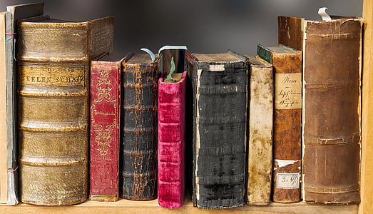 assorted-color covered books on shelf thumbnail