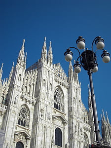 white chapel under blue sky thumbnail