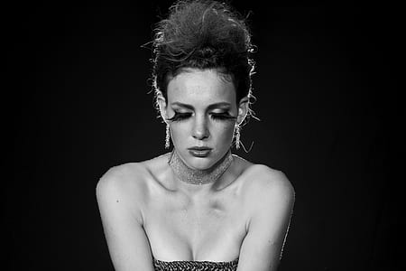 grayscale photography of woman in strapless top thumbnail