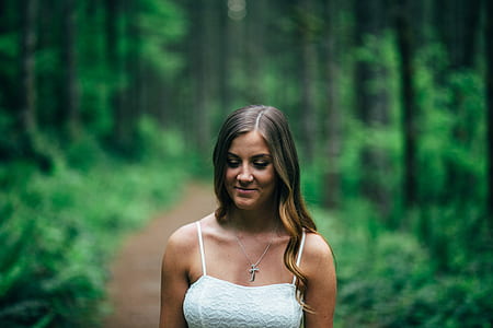 woman wearing white spaghetti strap shirt selected focus photography thumbnail