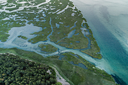 aerial view of body of water during daytime thumbnail