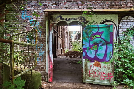 opened graffiti painted door thumbnail