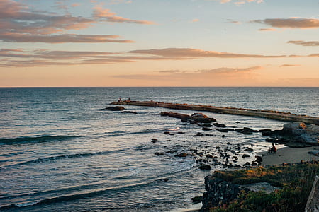 view of concrete dock during sunset thumbnail