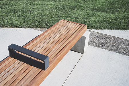black metal bar on brown wooden bench thumbnail