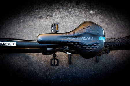 black bicycle saddle close-up photo thumbnail