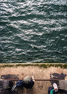 person standing near body of water fishing thumbnail