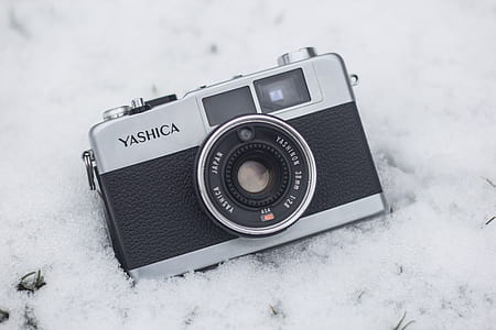 gray Yashica range finder camera on white surface thumbnail