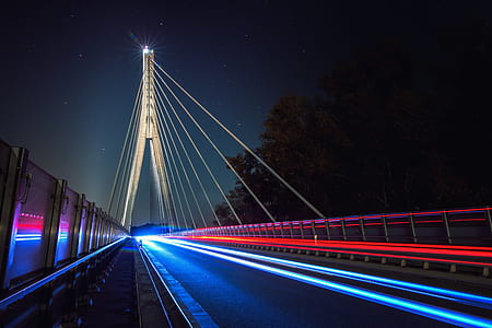 time lapse photo of suspension bridge thumbnail