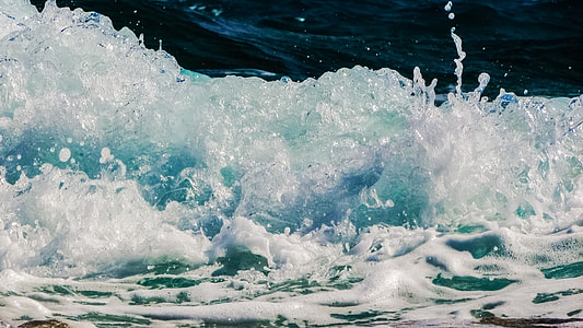 splash of water during daytime thumbnail