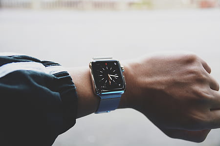 silver Apple Watch with silver milanese strap thumbnail