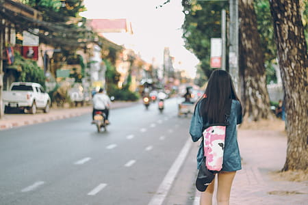 Photo of Woman Walking in the Street thumbnail