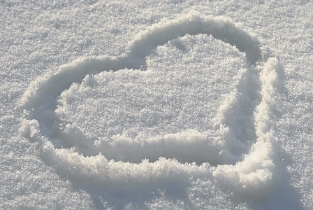 heart illustration drawn on snow at daytime thumbnail