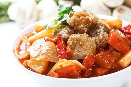 cooked meats on white ceramic bowl thumbnail