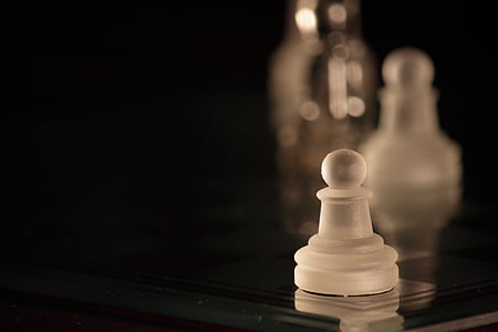 white wooden chess part thumbnail