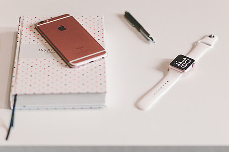 White Apple Watch and iPhone thumbnail