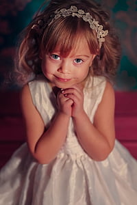 brown haired girl in white sleeveless dress thumbnail