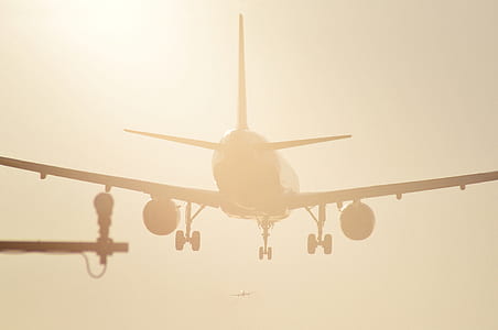 photography of airliner during daytime thumbnail