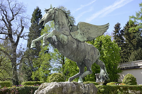 gray and white horse statue during daytime thumbnail