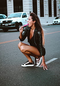 woman licking lollipop thumbnail
