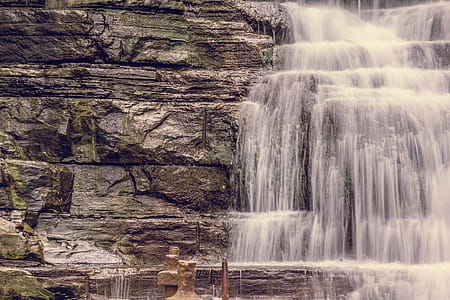 Rocky Edge And Waterfall Photo thumbnail