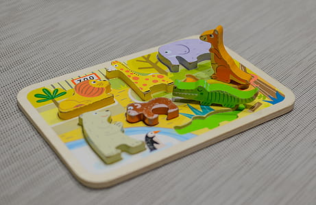 animal peg board on beige surface thumbnail