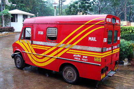 red and yellow mail van thumbnail