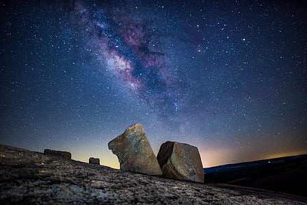 brown rock formation under blue sk thumbnail