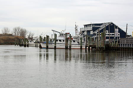 Small fishing boat moored at a dock in Point Pleasant New Jersey. thumbnail