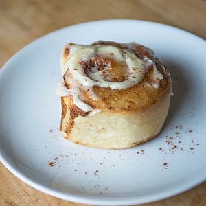 baked pastry with creme on round white plate thumbnail