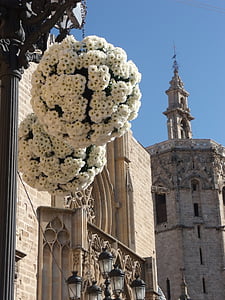 white petaled flowers hanged on metal column thumbnail