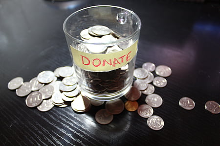 Donate glass with coins thumbnail