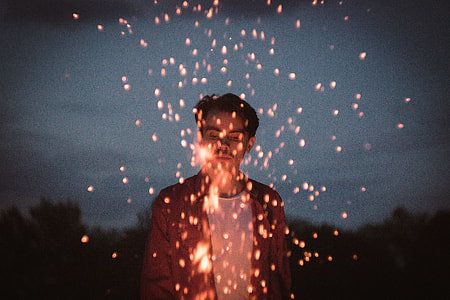 photography of man playing fire thumbnail