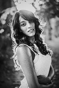 Grayscale Photography Of Woman Wearing Lace Sleeveless Top thumbnail