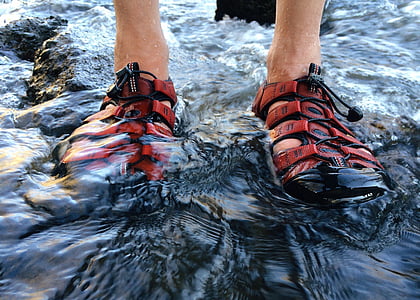 person wearing red hiking sandals thumbnail