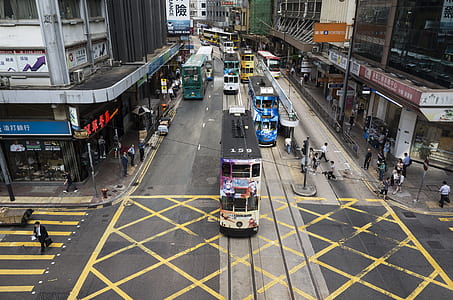 person walking on sidewalk during daytime thumbnail