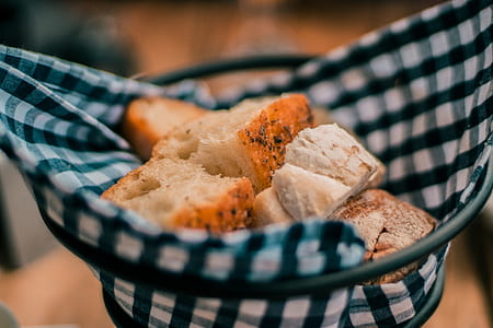shallow focus photography of toasted bread in basket thumbnail