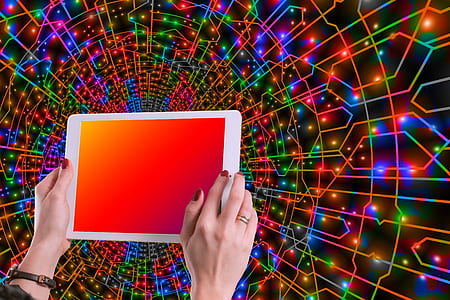 person holding white tablet computer thumbnail