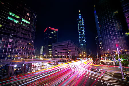timelapse photography of city buildings thumbnail