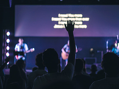 person attending in concert event during night time thumbnail