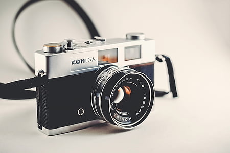 gray and black Konica SLR camera thumbnail