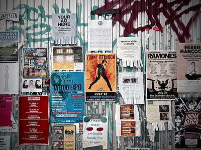 assorted poster on wall thumbnail