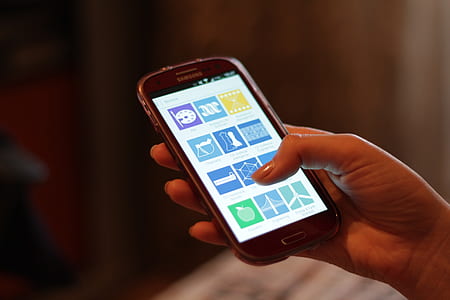 person using black Samsung Android smartphone thumbnail