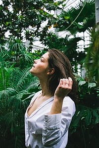 woman holding her hair thumbnail