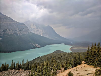 aerial photography of mountain near body of water thumbnail