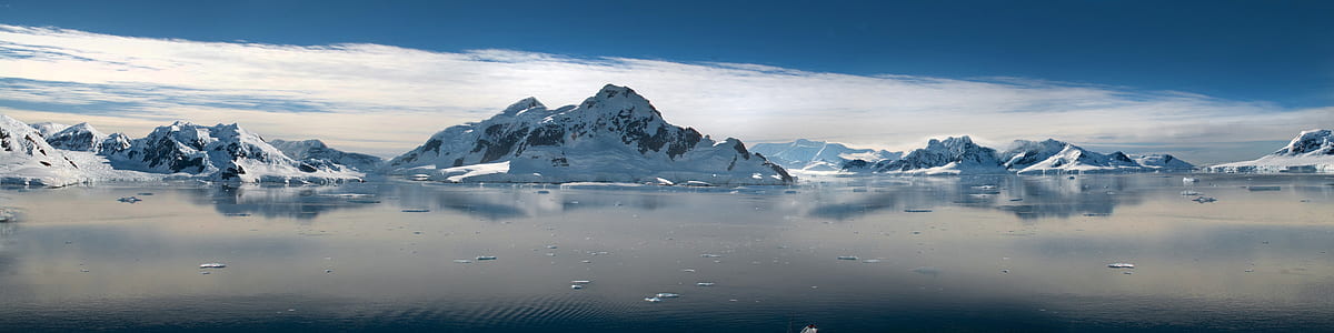 panoramic photography of white mountains covered with snow at daytime thumbnail